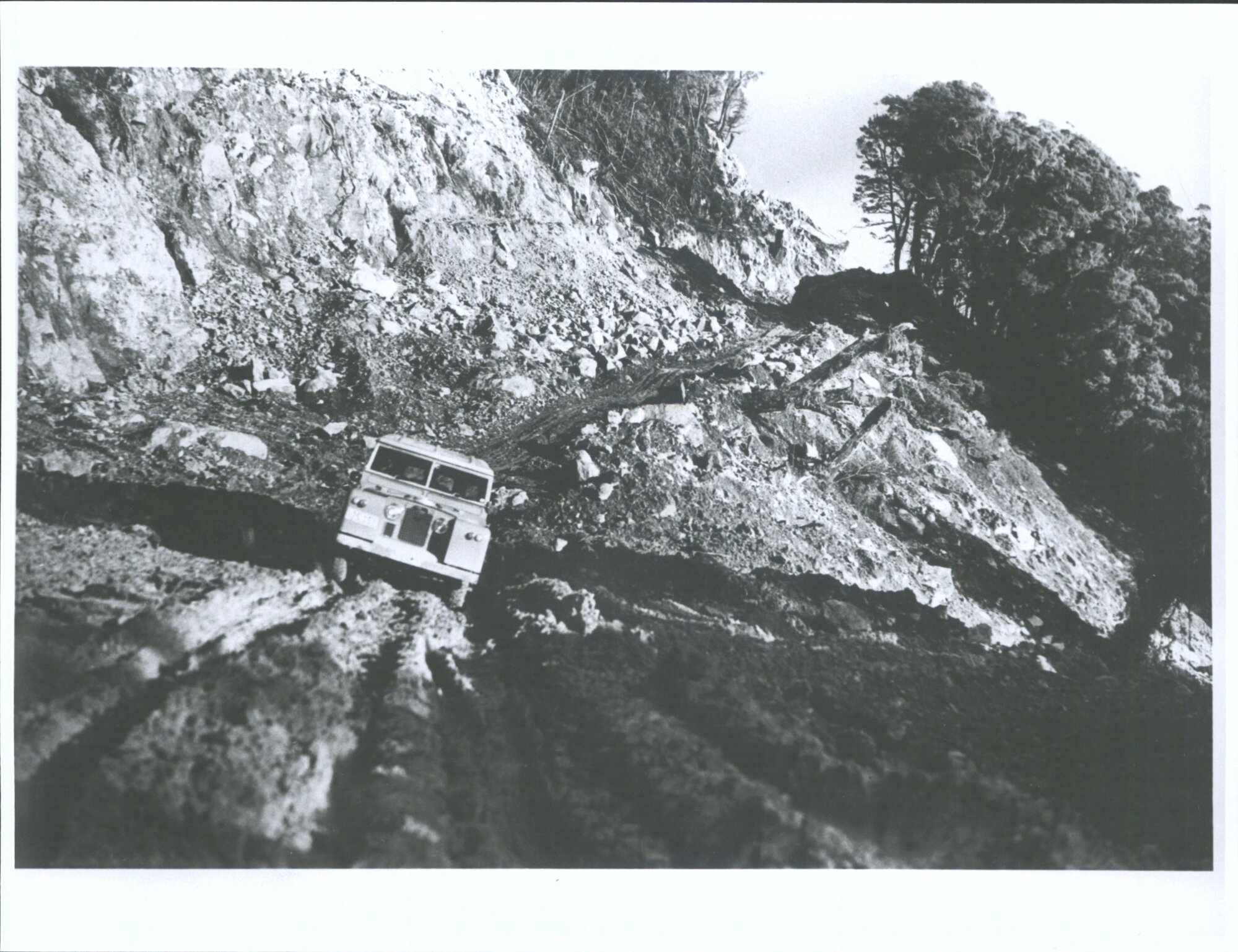 "Rugged conditions, even for four-wheel-drive vehicles, near Grave Creek, in the last four-mile contract on the Haast route."