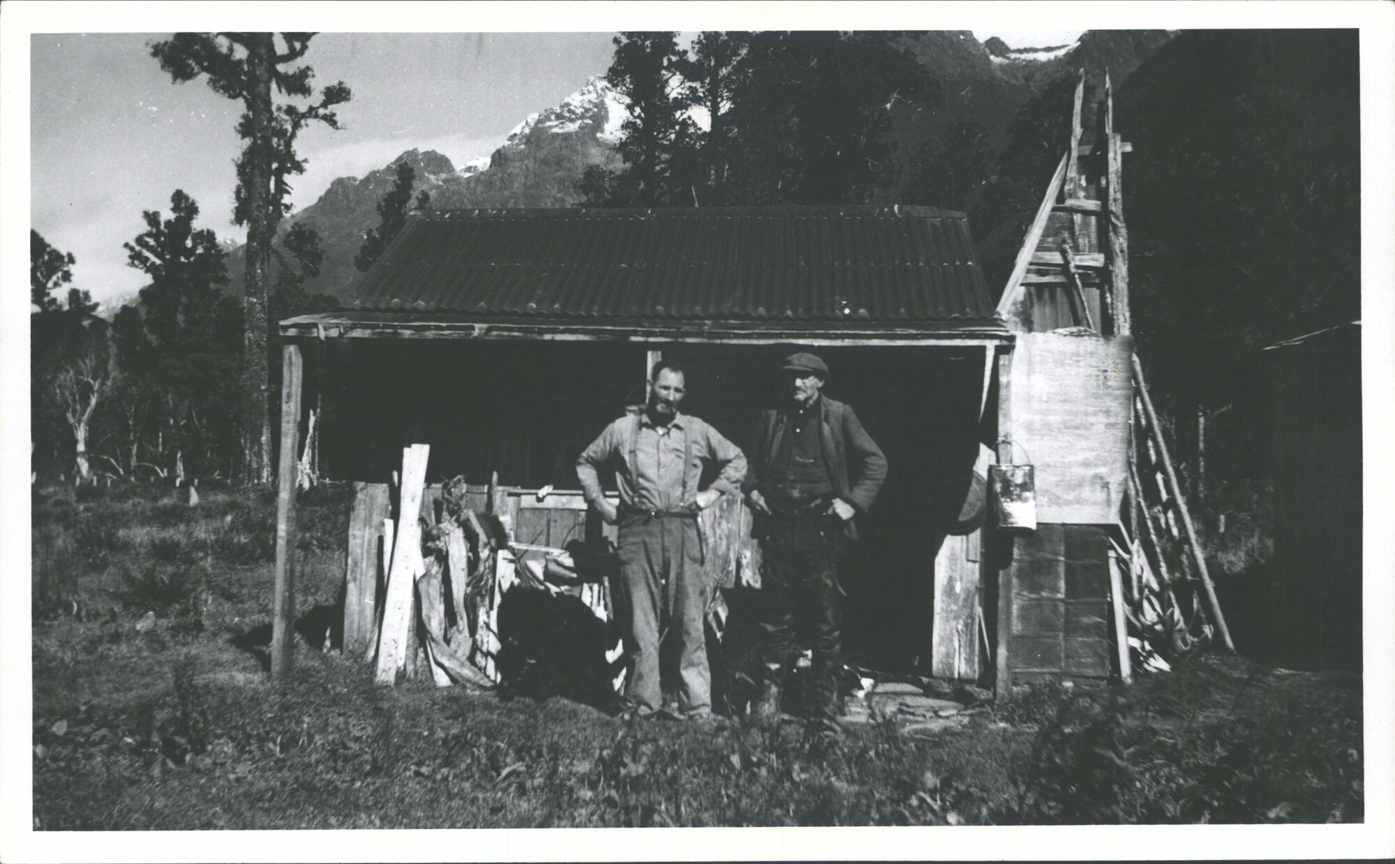 Hidden Falls  hut with Hugh McKenzie (right)  and Dave McDonald  (left)
