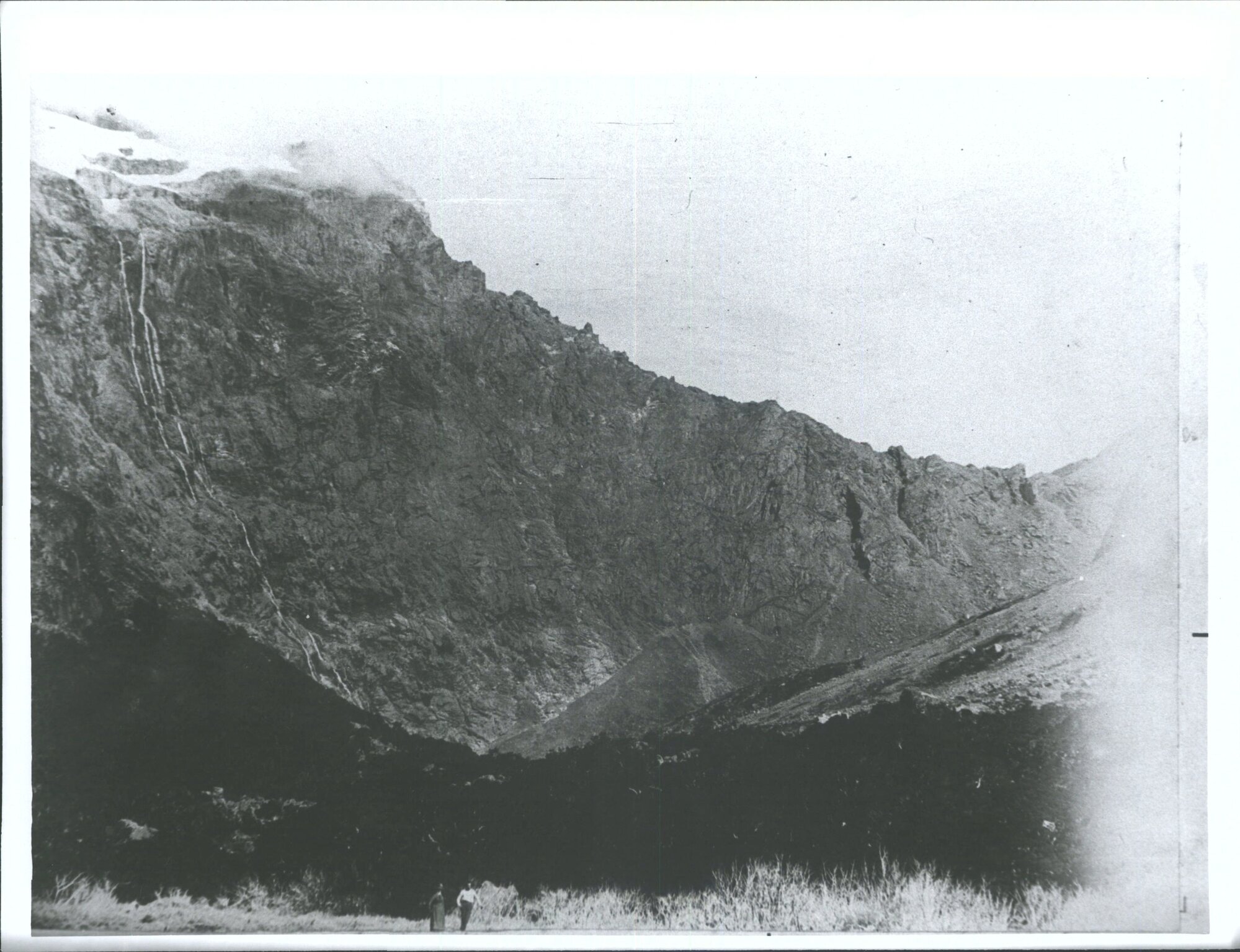The saddle is 2000 feet above the figures in foreground, the waterfall to the left so about 3,500 feet high"