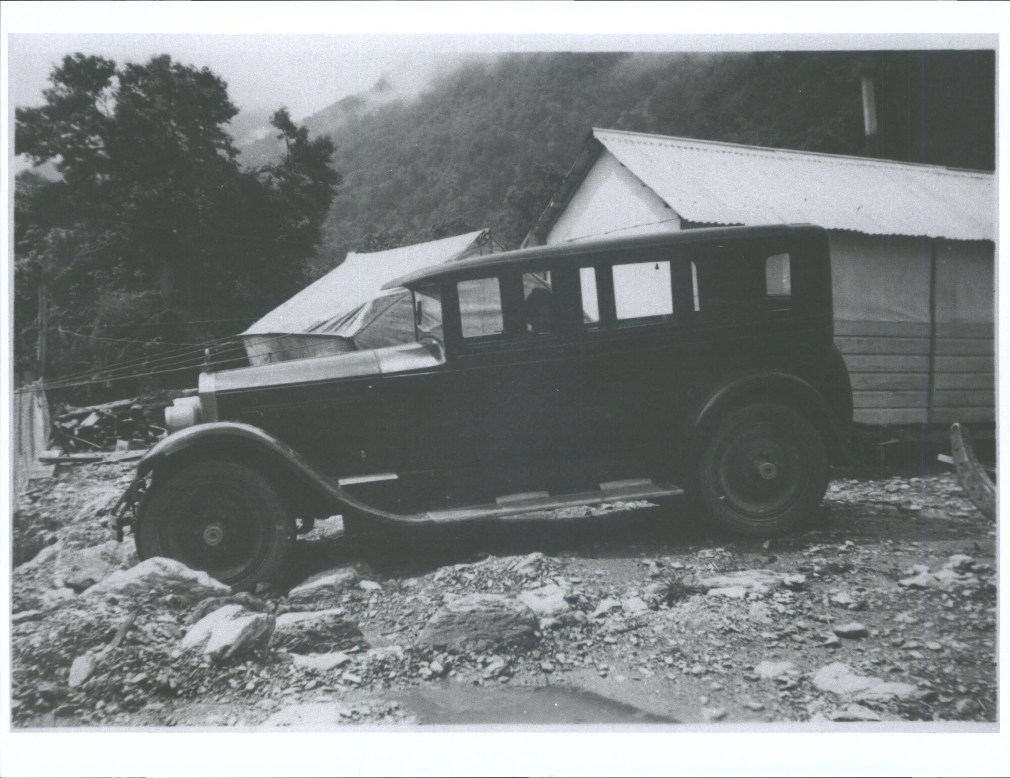 "Your car &amp; Mrs Wills at Hendersons Flat at Five Mile Camp, as far as we went down the Lower Hollyford road"