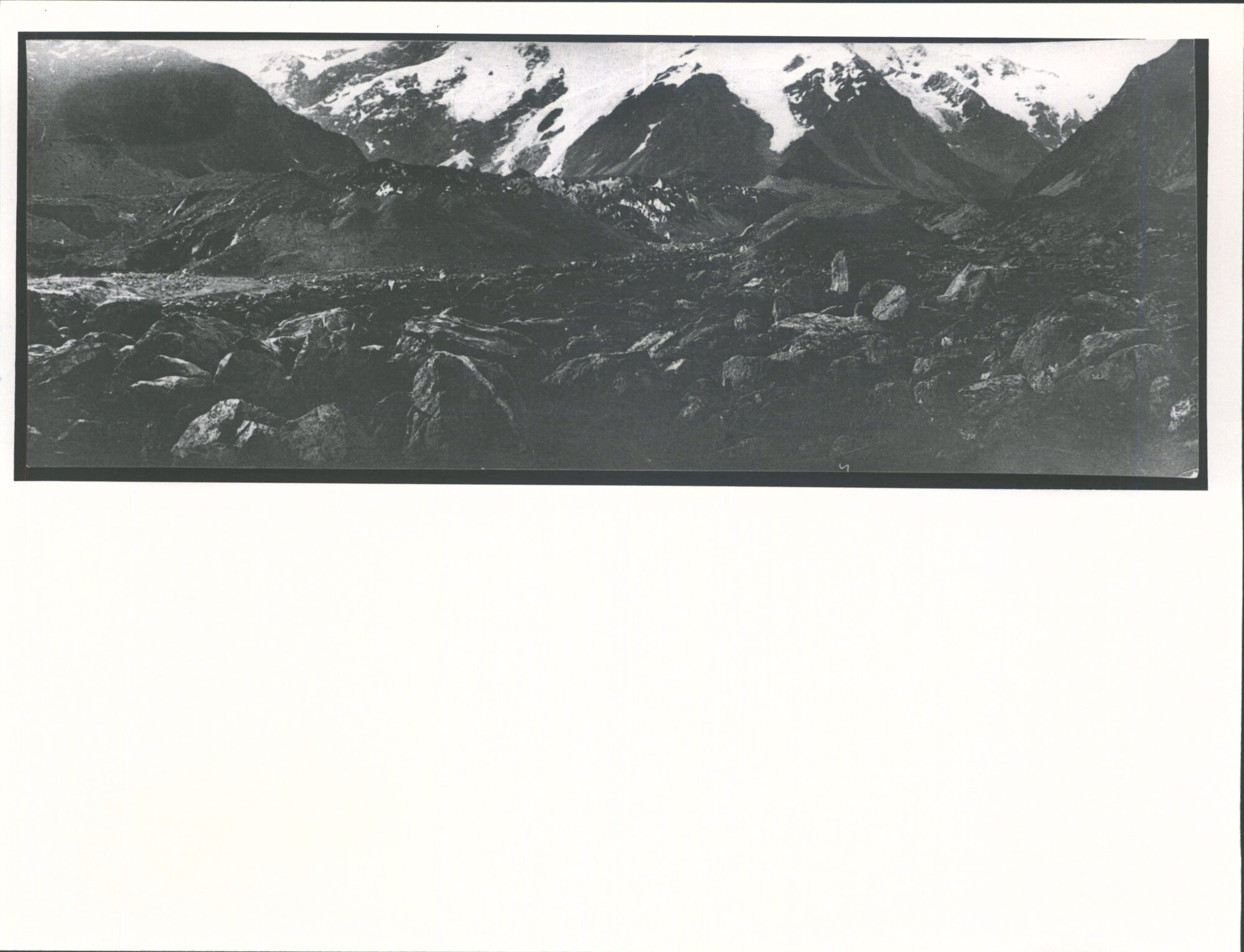 Old bed of Hooker River with terminal face of Mueller Glacier