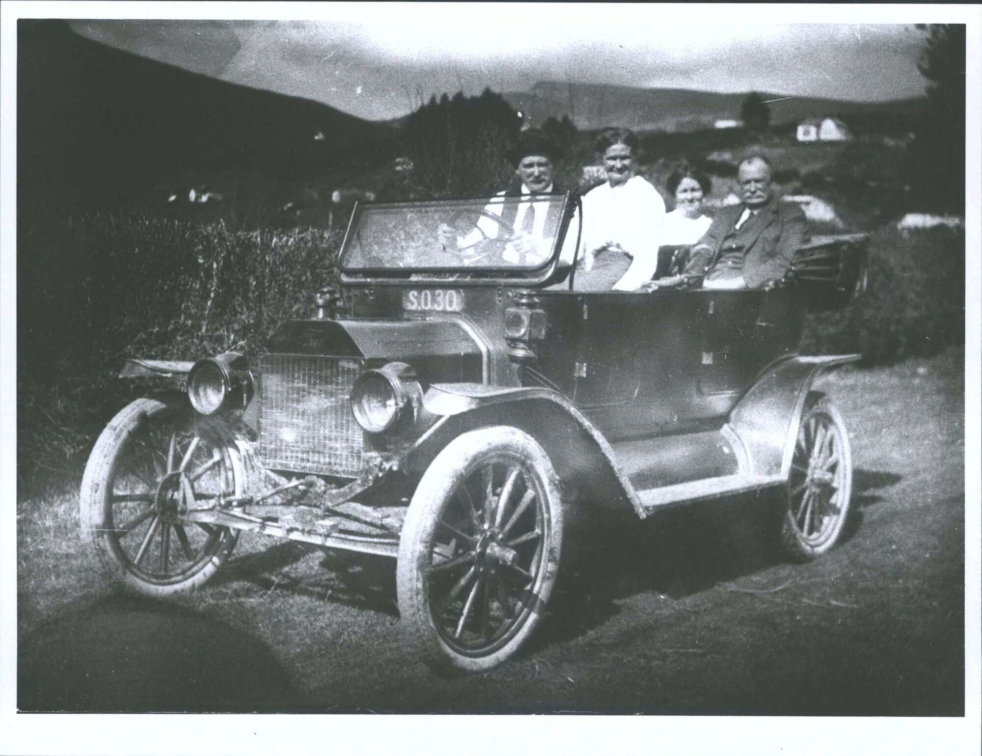 Ford car at Waitati in front of Kays House