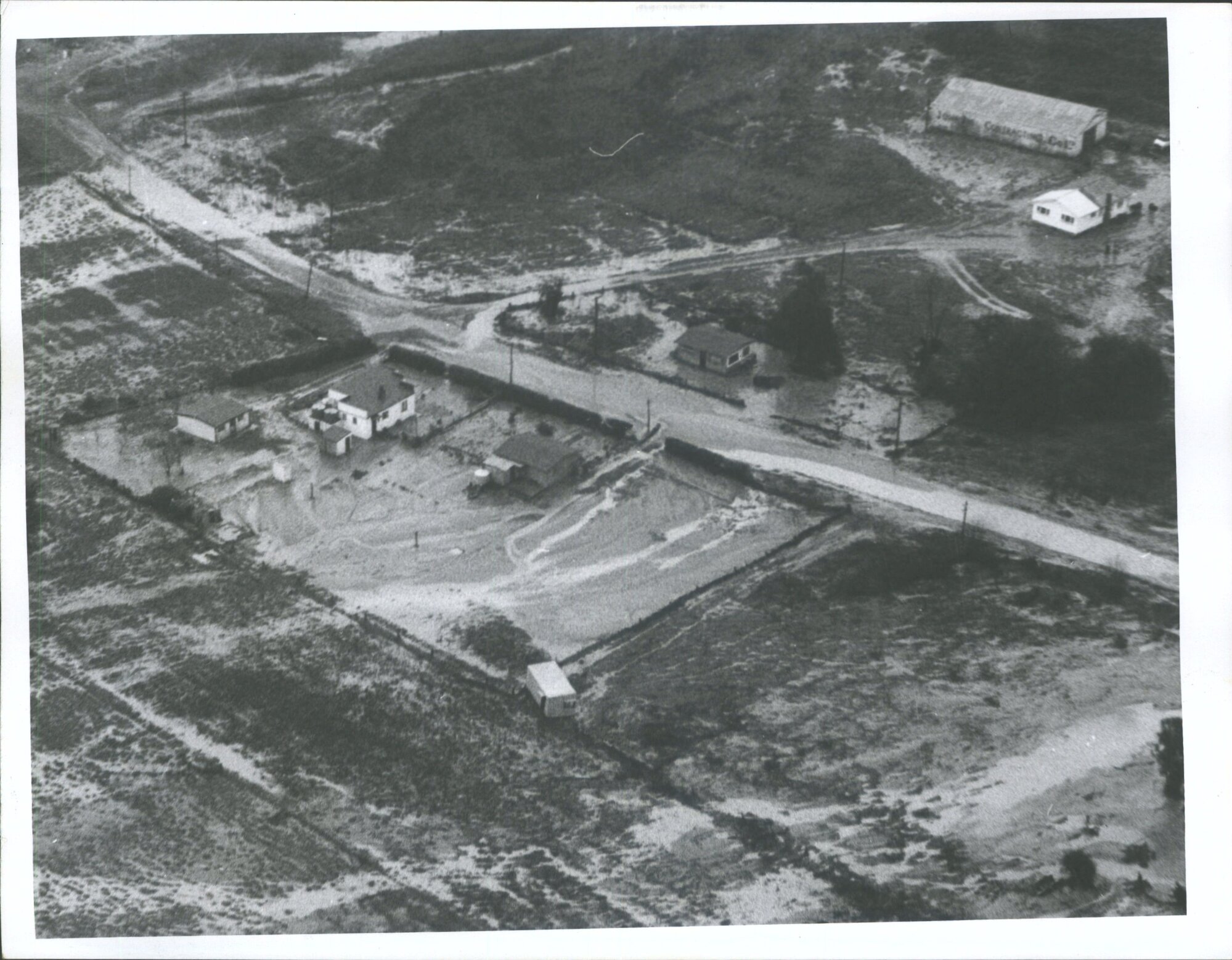 Floods Tangoio Valley (23Km from Napier)  Tangoio Valley homes surrounded by 5' of sludge &amp; receding flood waters