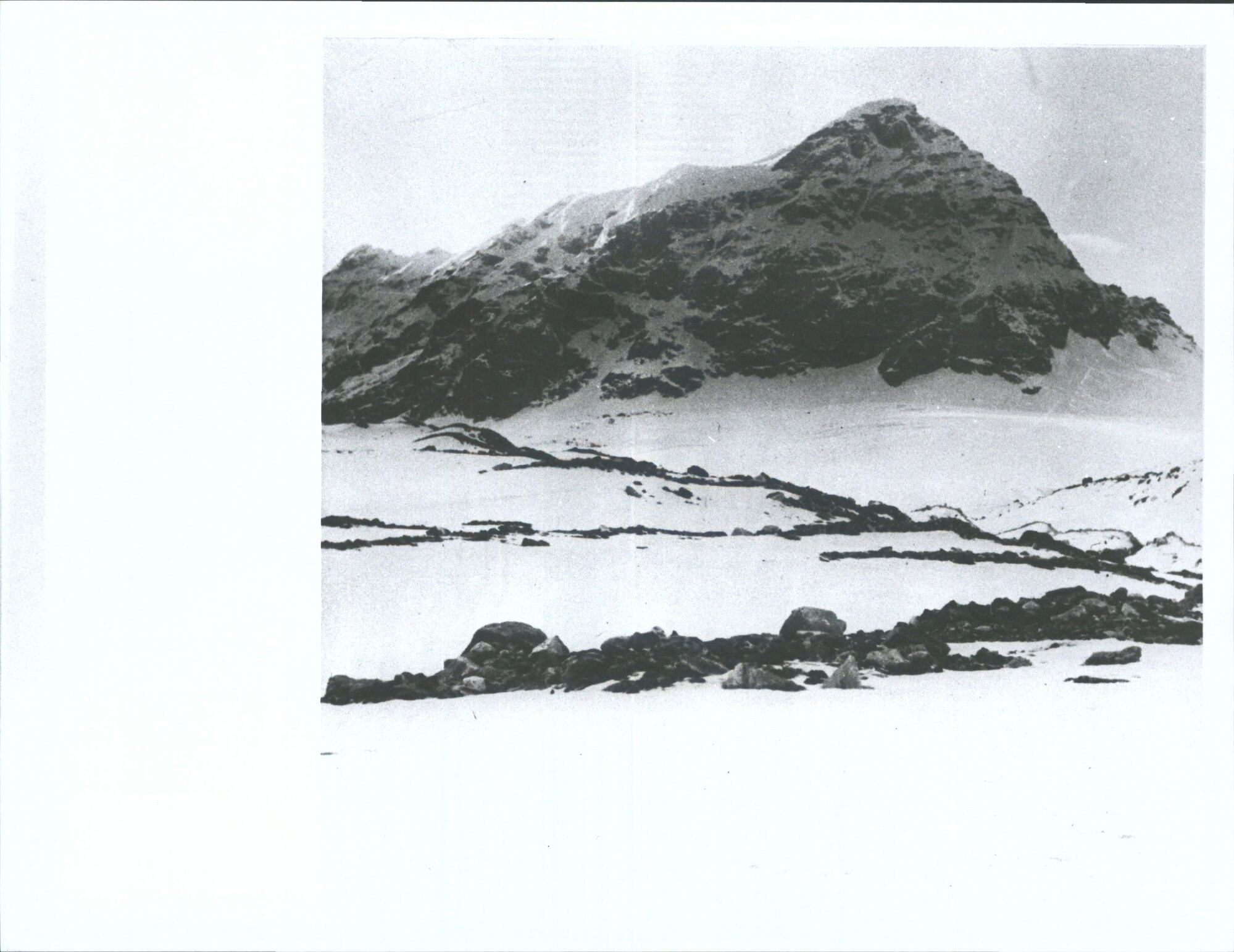 "A Fine Peak, 19,600 ft high, climbed by Evans   Harrow as seen from the Survey Camp of the Iswa Exploration party."