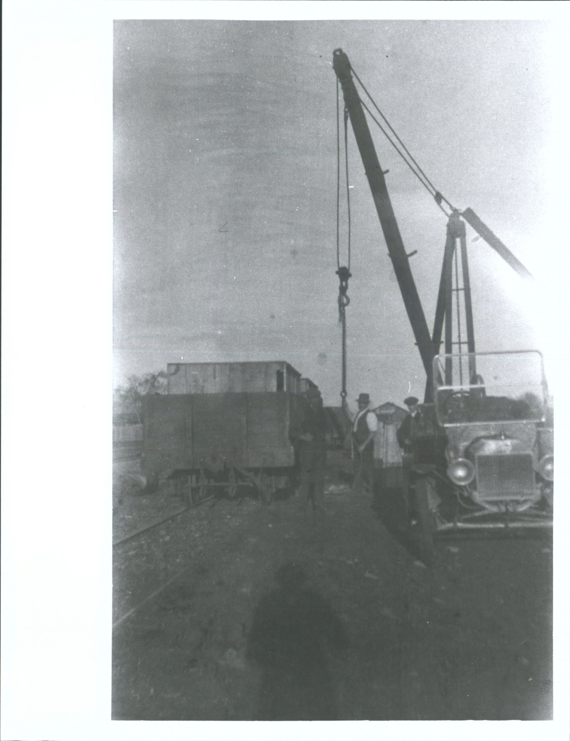 unloading cars of Ashburton Railway stn.