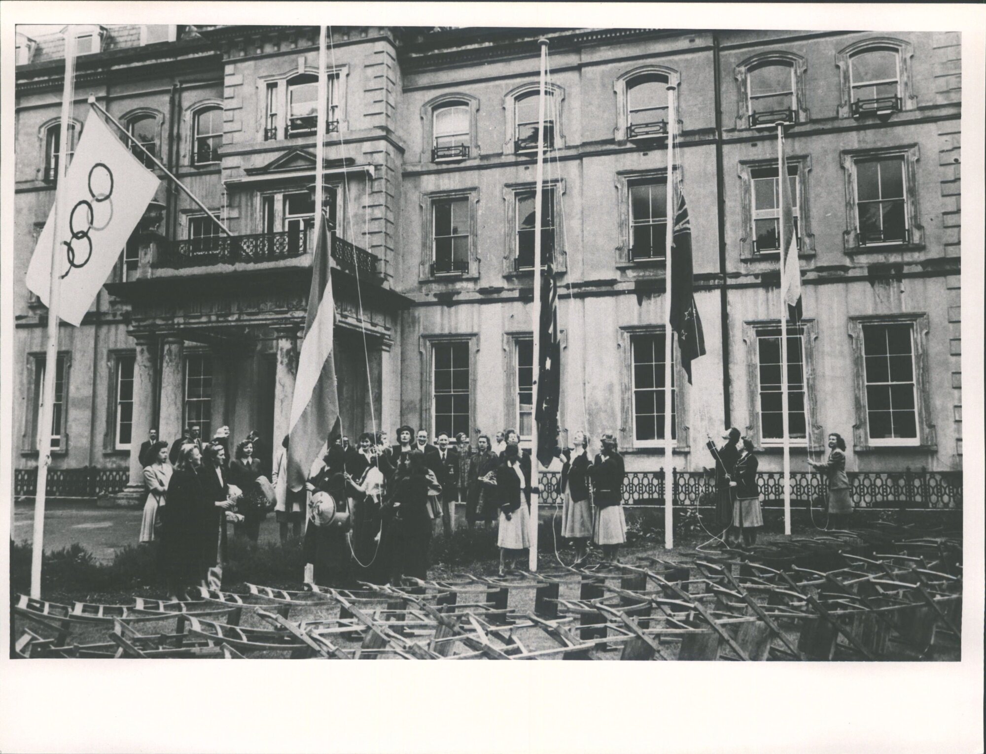 Women athletes unfurling their national flags