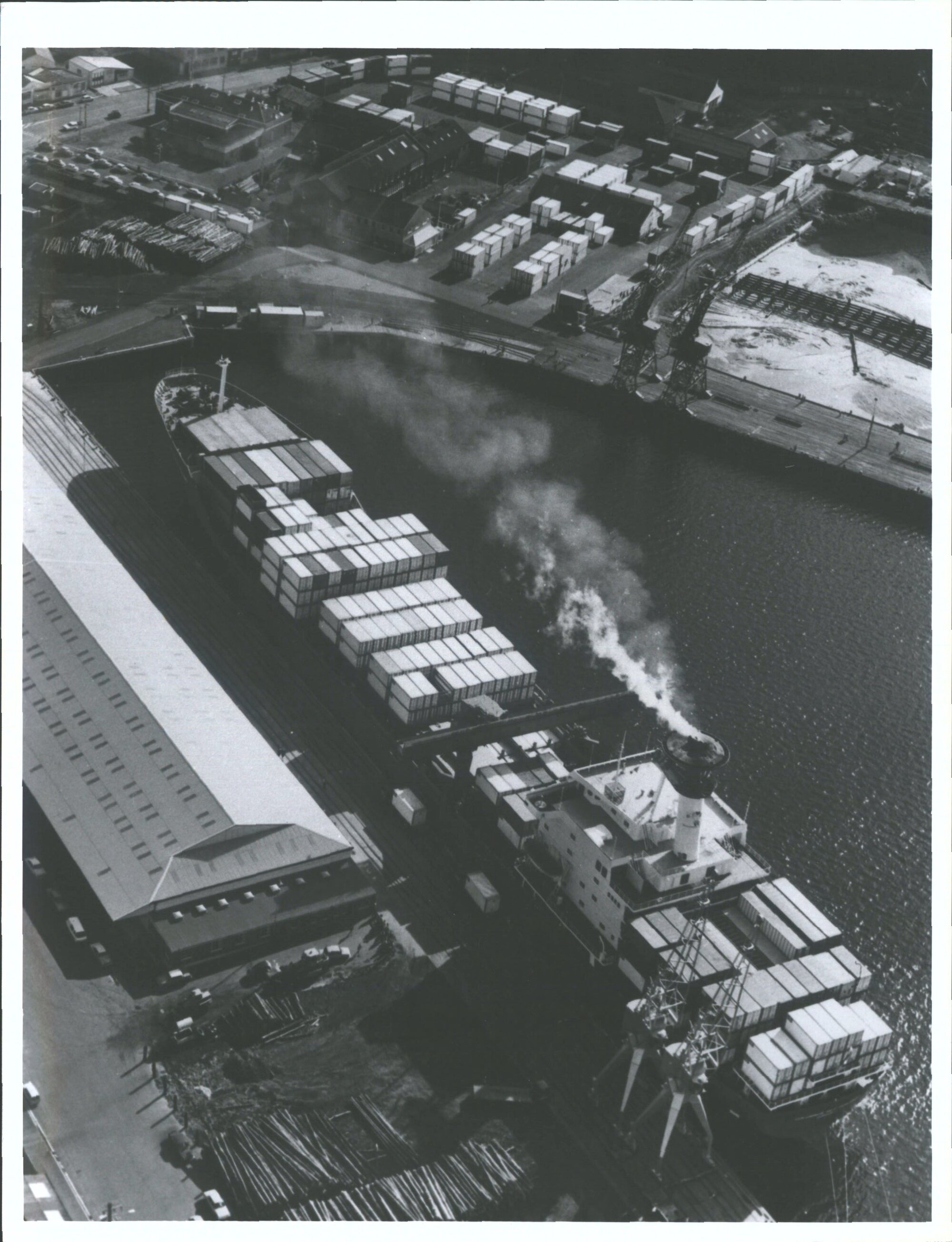 containers are stacked ... Columbus New Zealand berthed yesterday