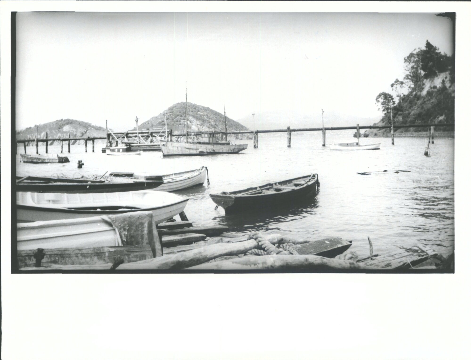 With pipeline for pumping sand from Dredge Vulcan for reclamation of Mussel Bay.