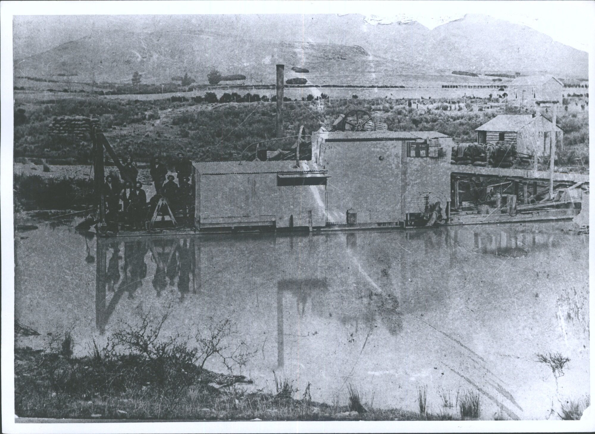 Group of men on dredge at Tuapeka Mouth