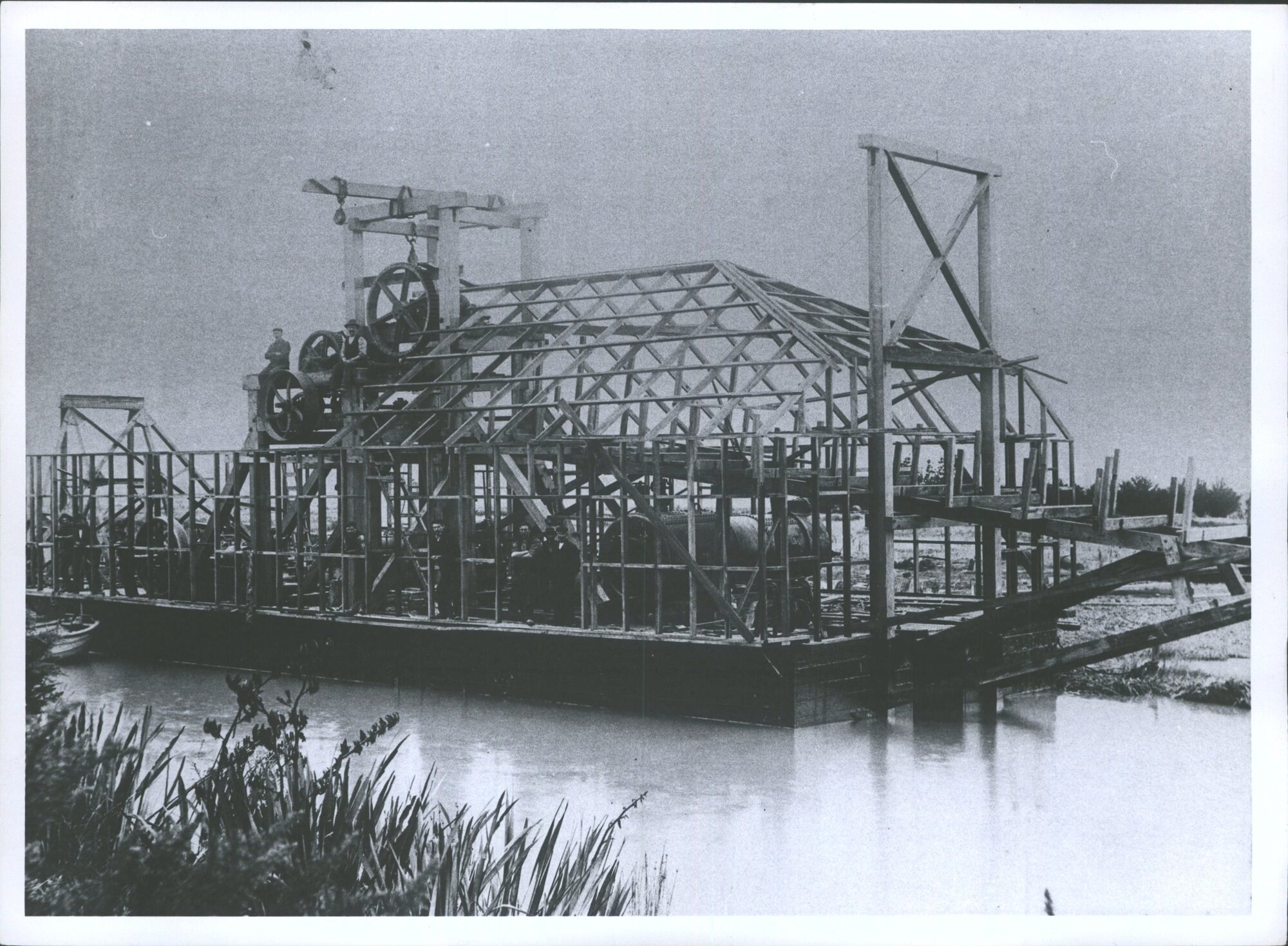 Dredge partially constructed with machinery in position