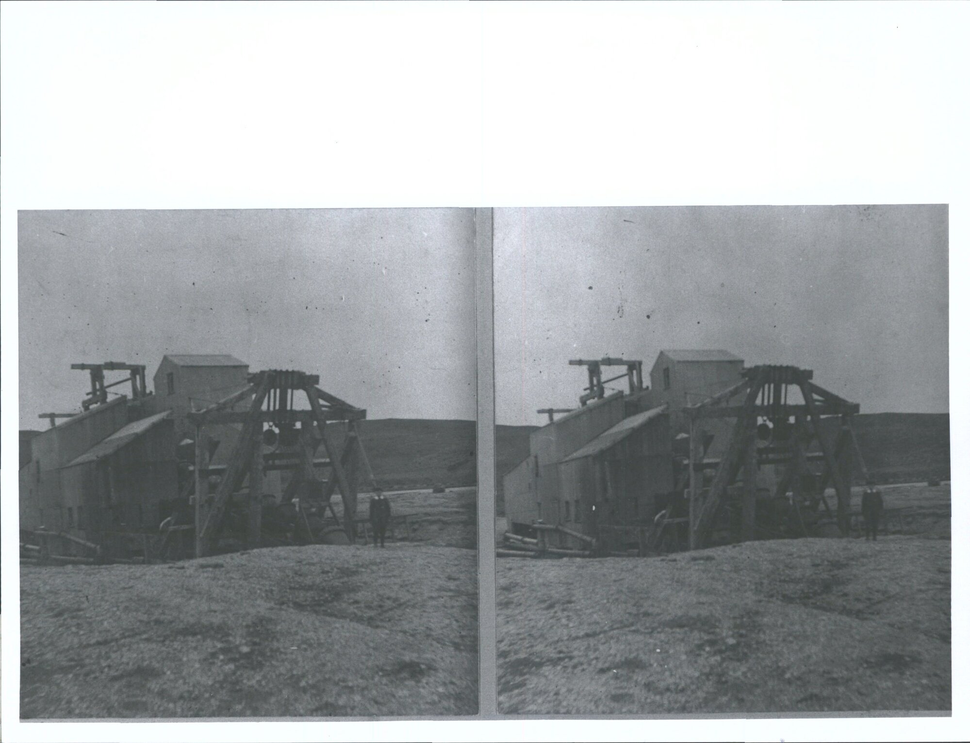 Goldmining Dredge at Jutland Flat. Boy Tippett in photo