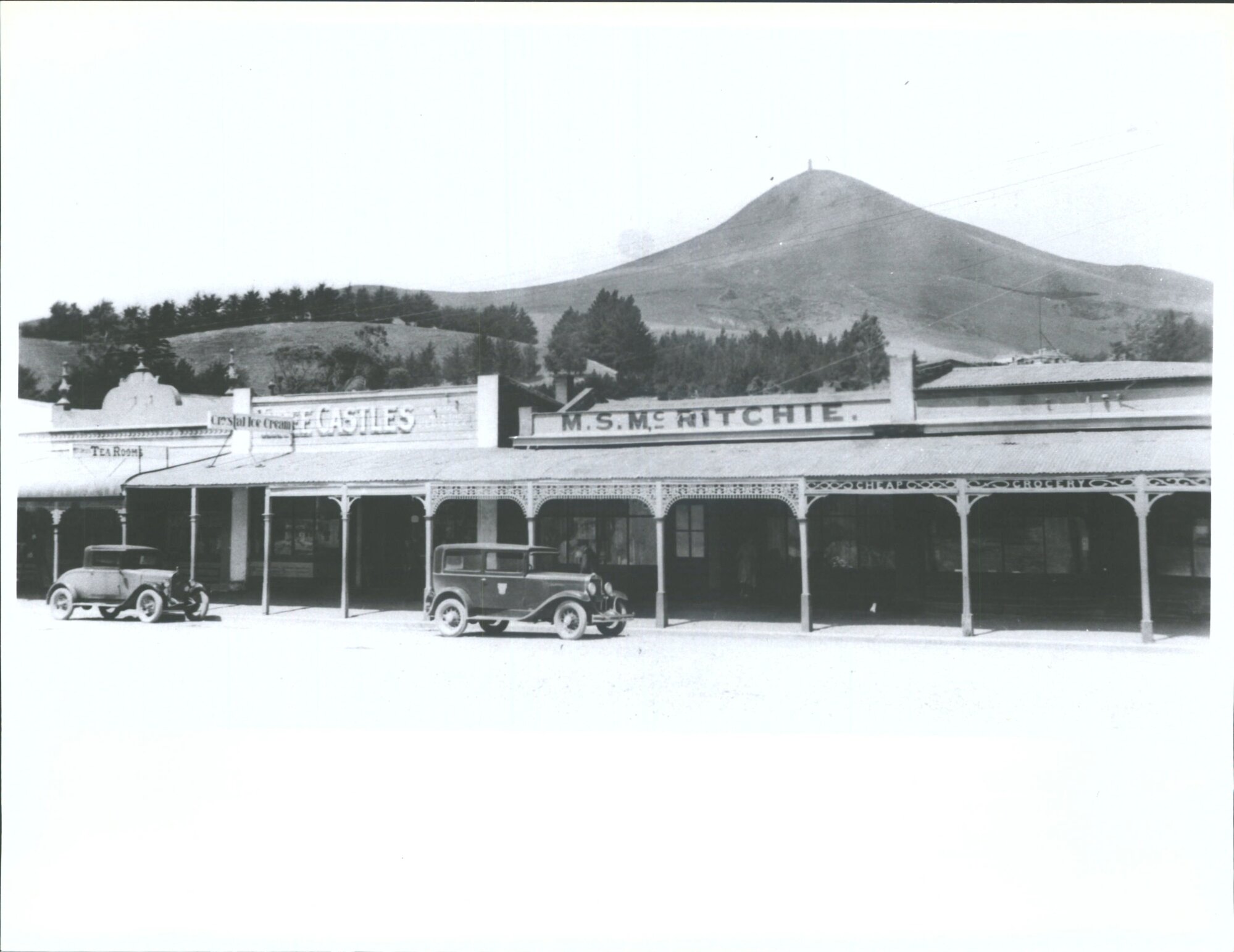 Street scene showing business premises of M.S. McRitchie and others