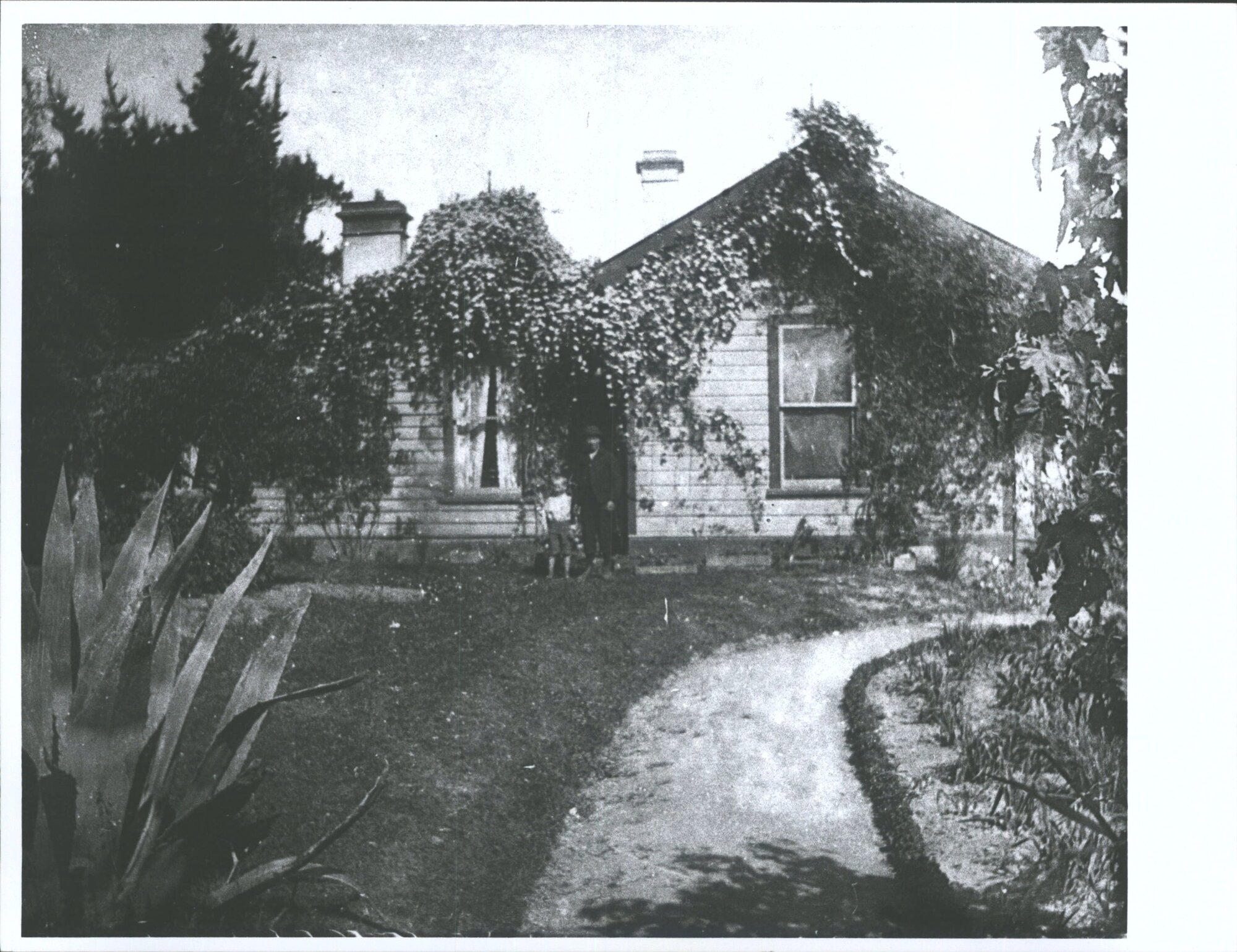 Unidentified Couple outside house