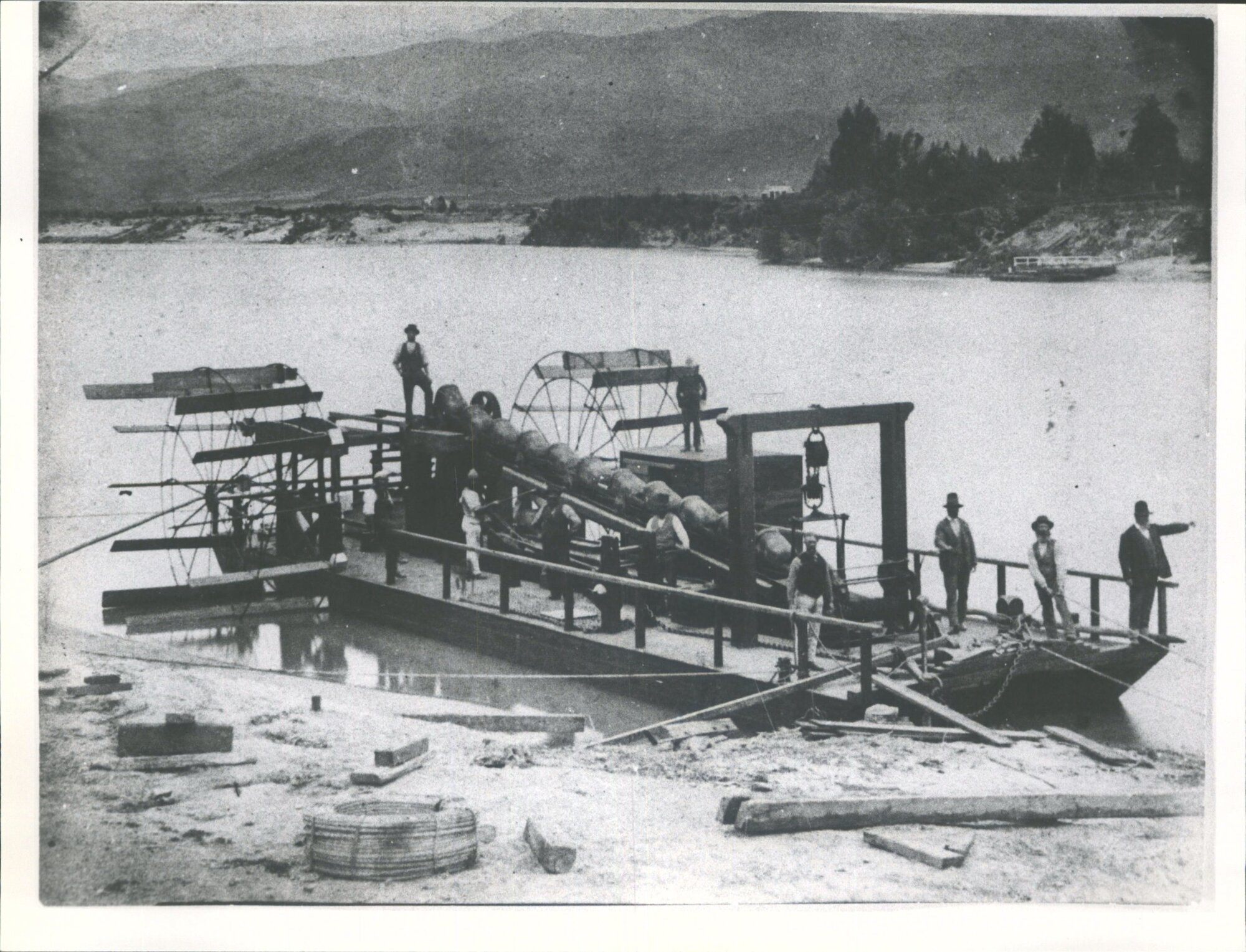 Goldmining Dredges. An early Current wheel dredge