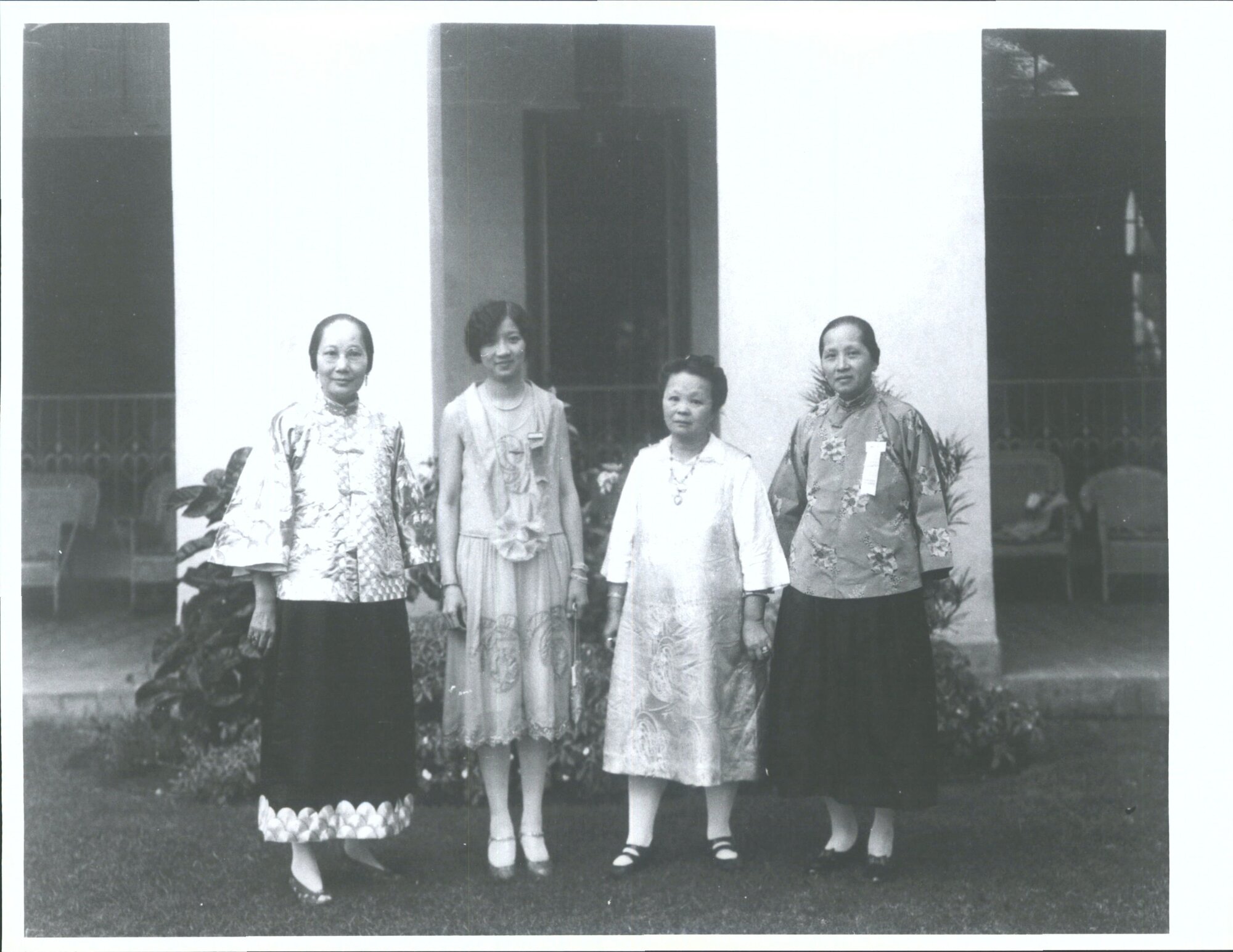 Four conference attendees or officials