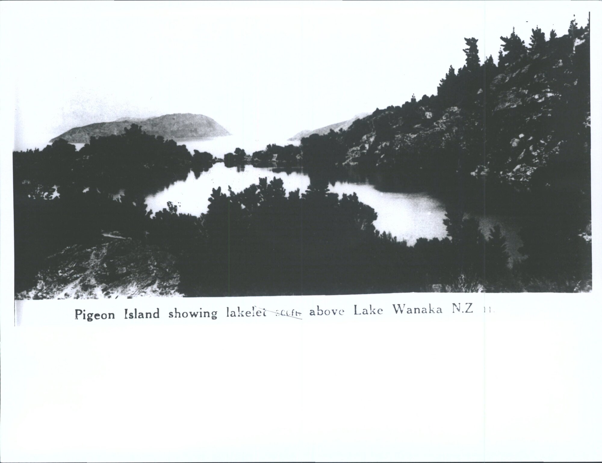 Pigeon Island showing lakelet 300ft above Lake Wanaka N.Z.