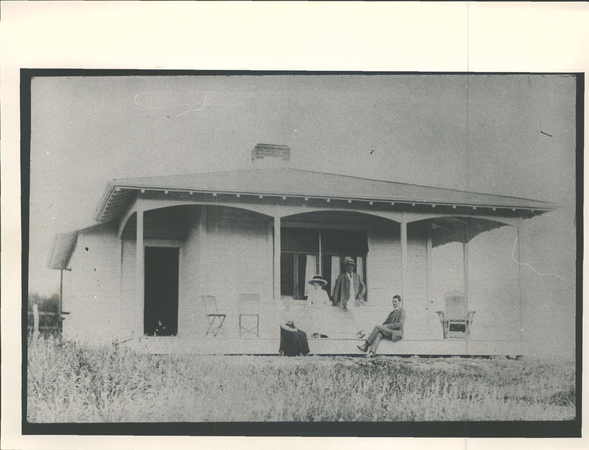 Unidentified group outside Warrington residence