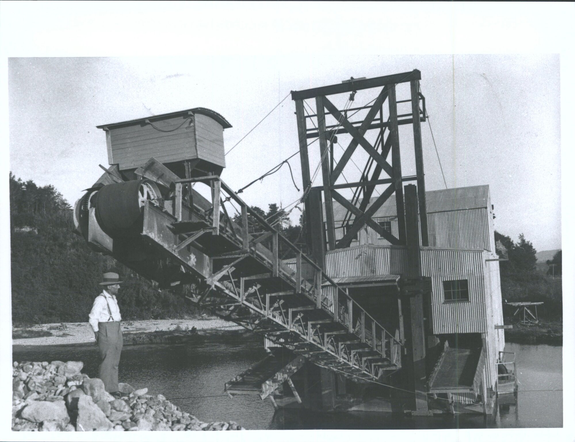 Man standing near dredge