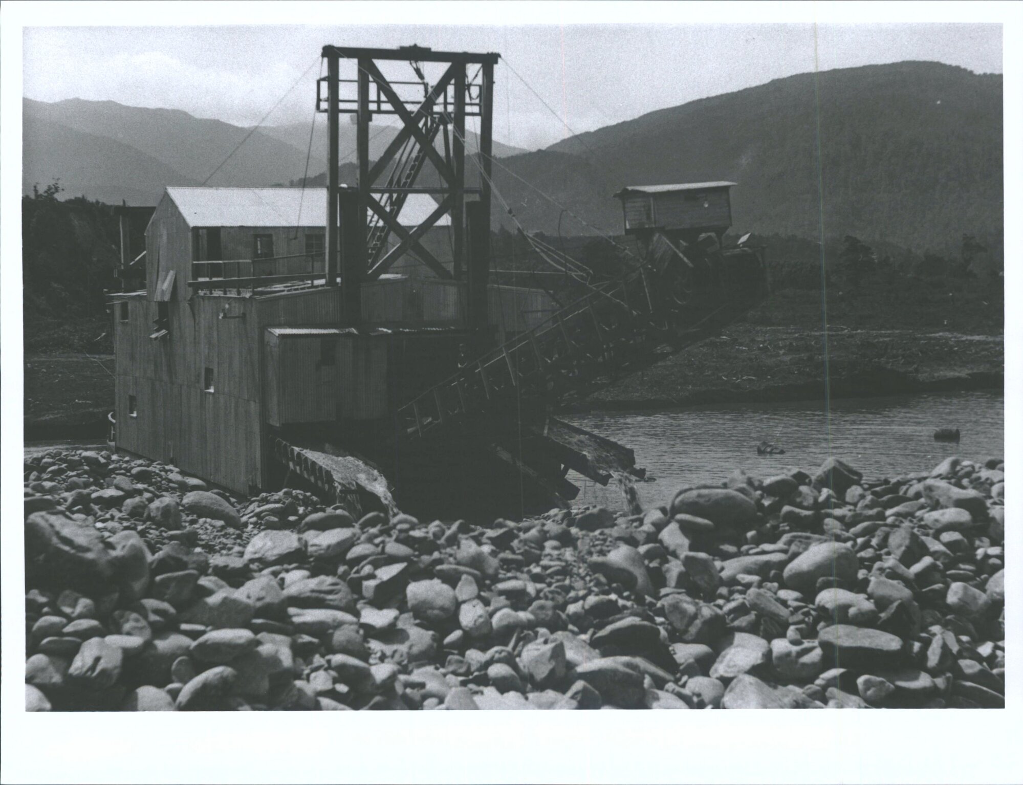 Man standing on dredge