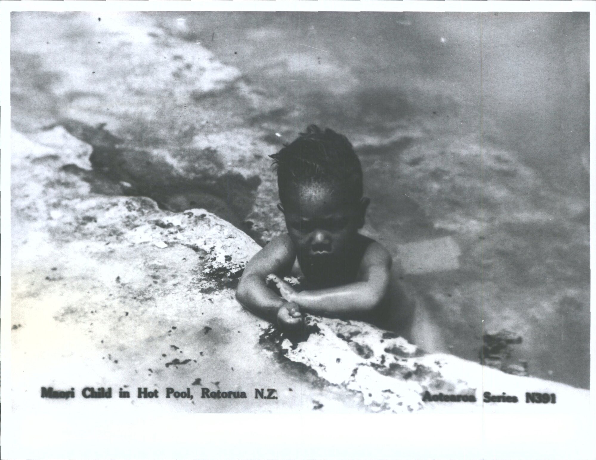 Maori Child in Hot Pool, Rotorua, N.Z.
