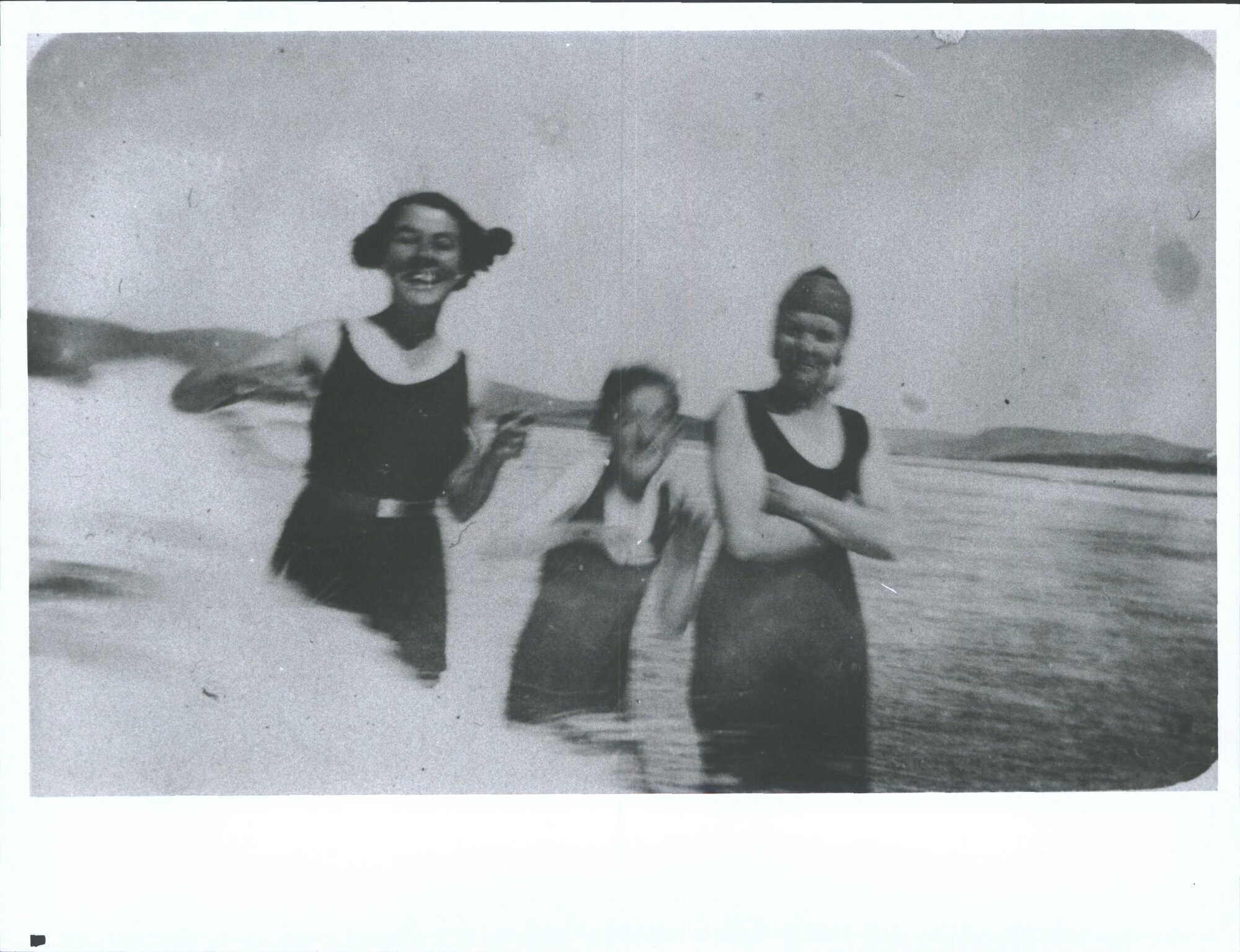 Swimming in the surf, Taieri Mouth