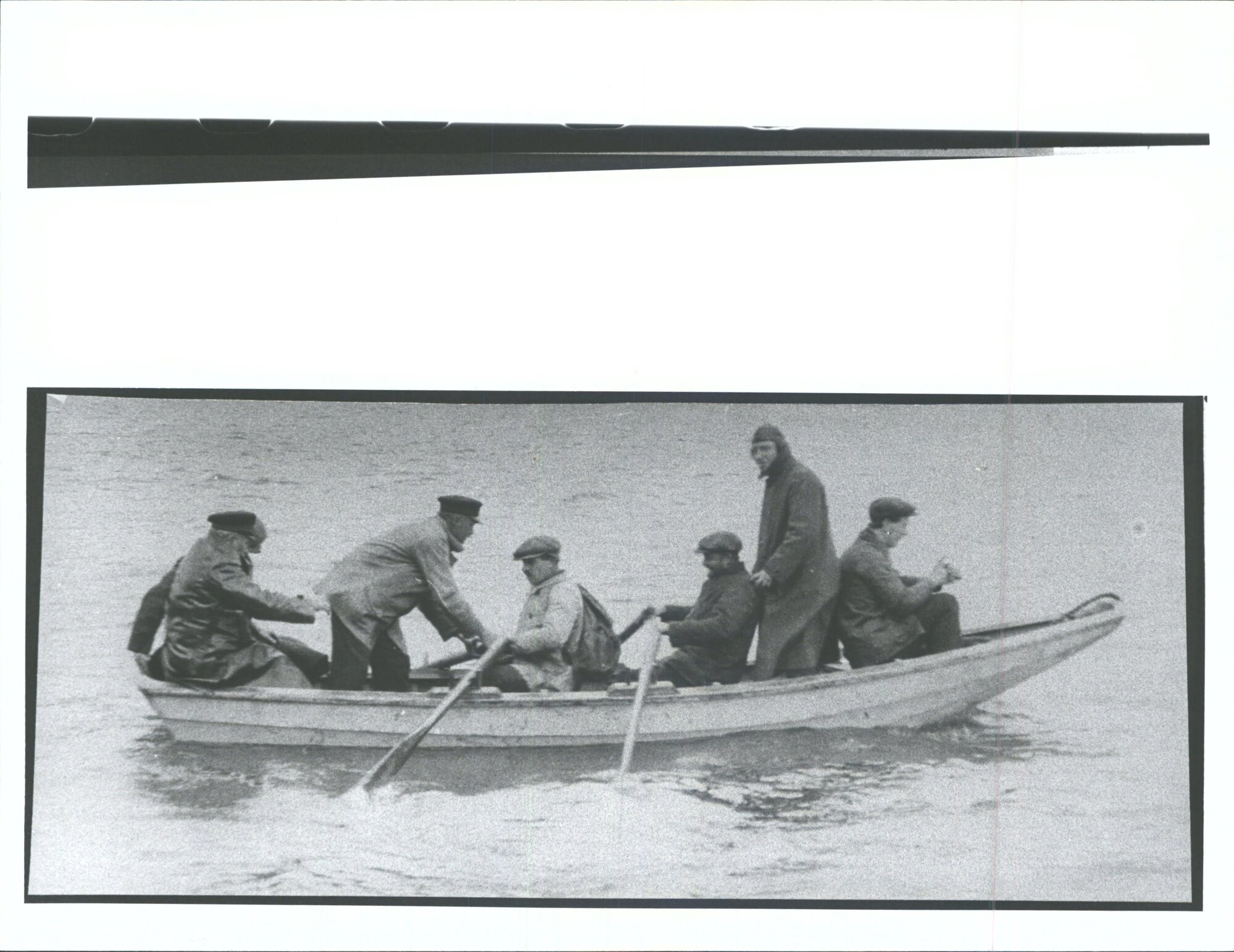 Whalers in a rowboat