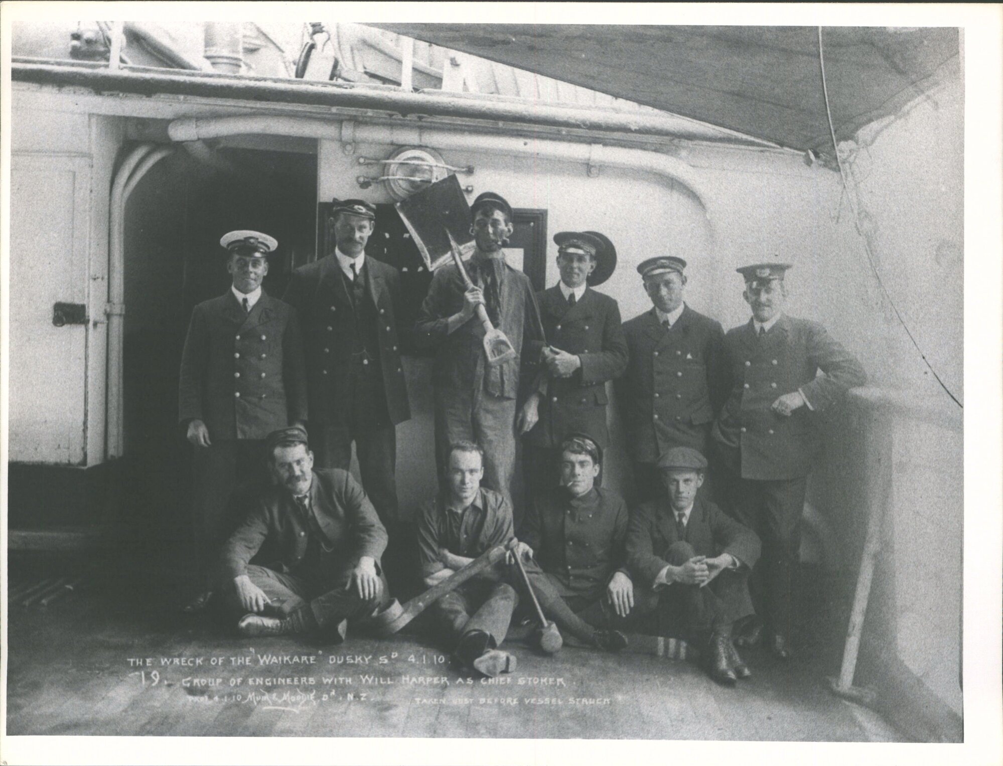 Waikare, wrecked Dusky Sound 4-1-10. Group of Engineers with Will Harper as Chief Stoker. Taken Just before vessel struck