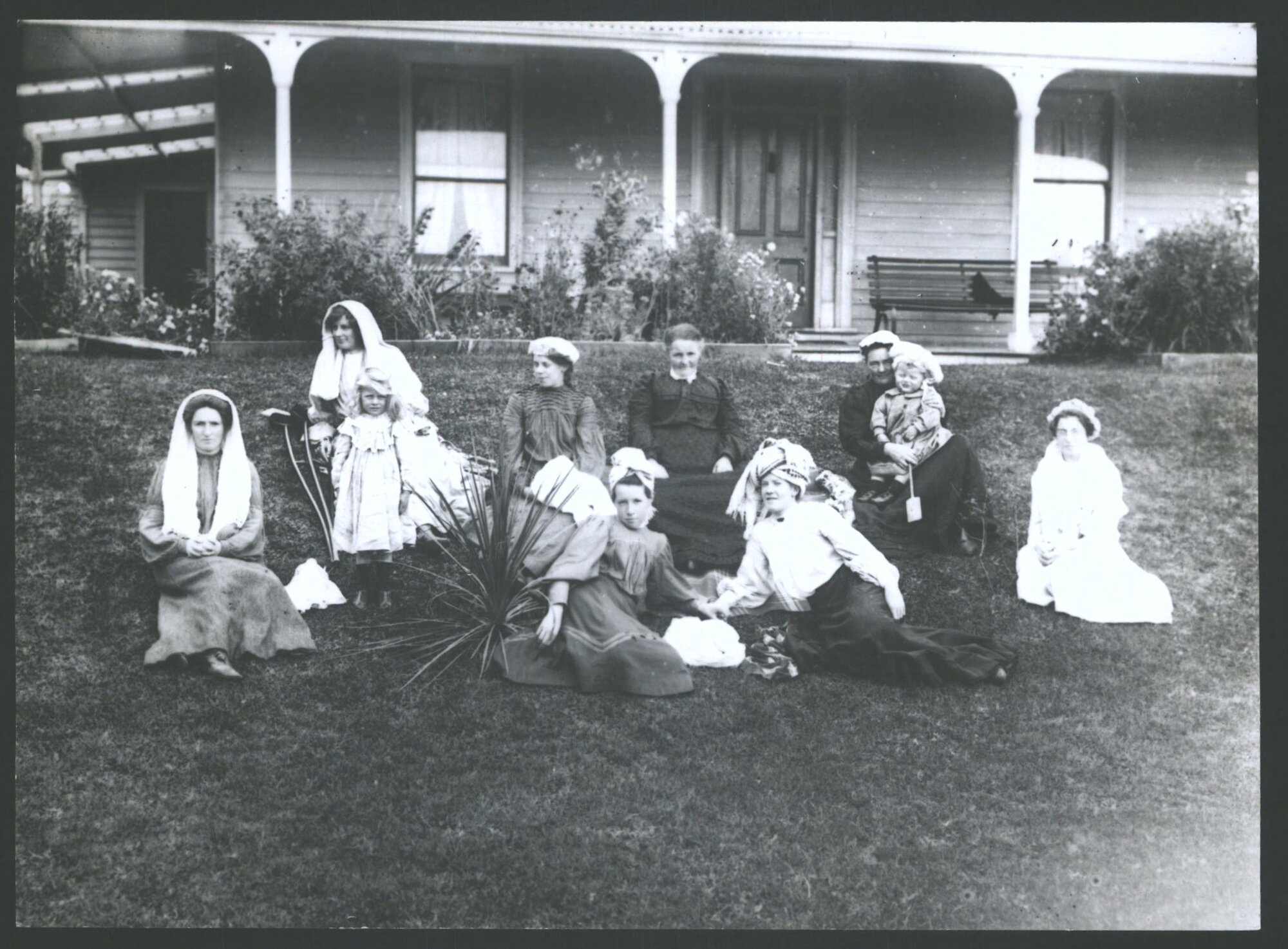 Sheddon group and friends in front of Connor's boarding House, Brighton