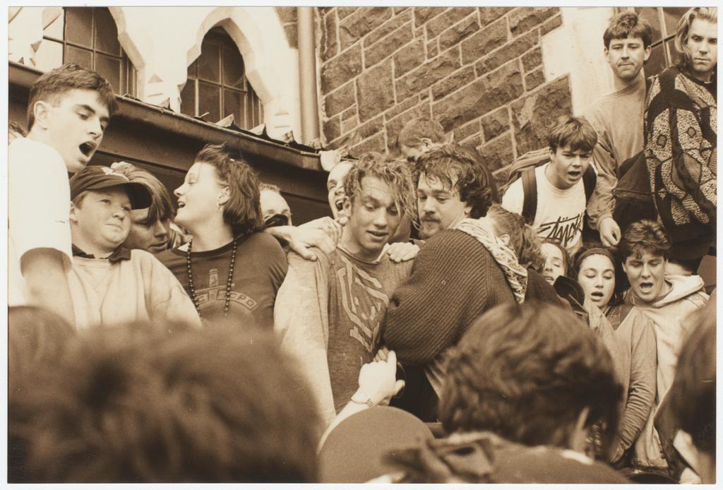 Students burning papers outside Registry building