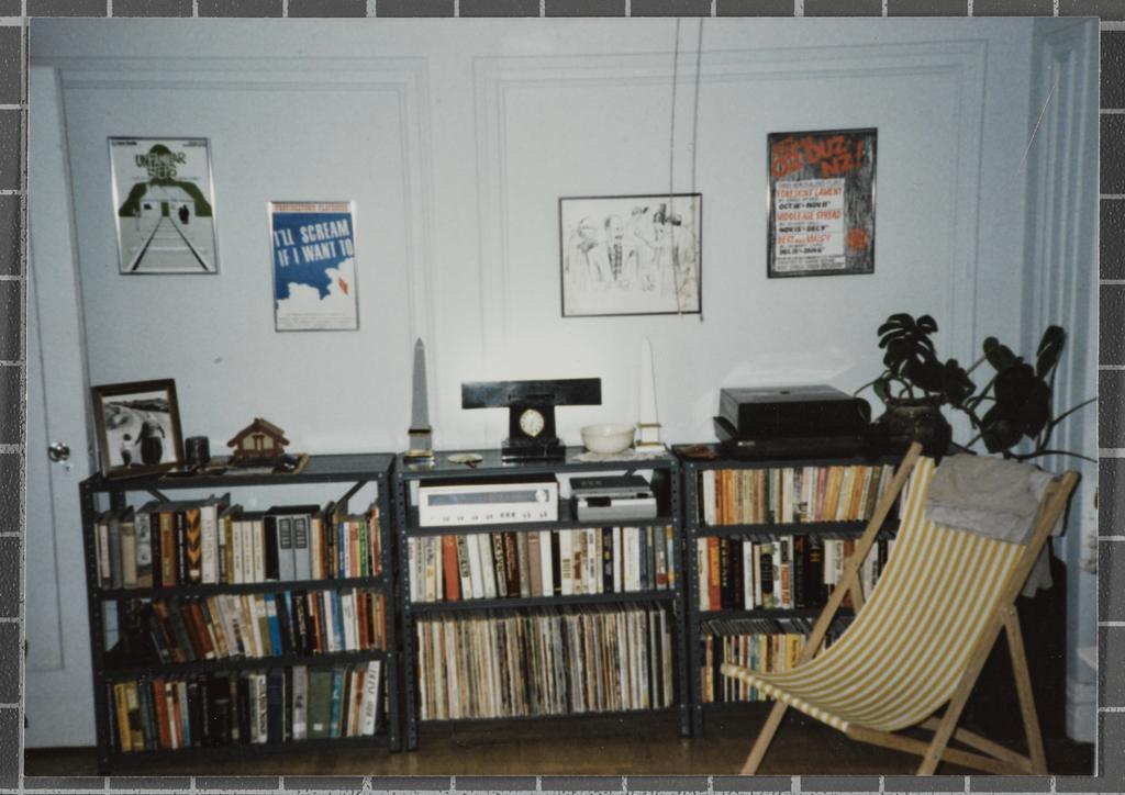 Bookshelf, chair in Robert Lord's apartment, 250 West 85th St, New York