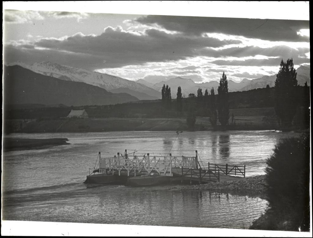 Punt, river, and mountains