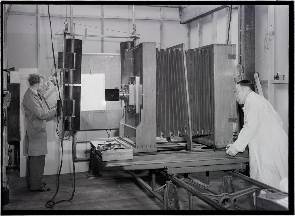Men with photographic equipment, Coulls Somerville Wilkie, Crawford Street, Dunedin