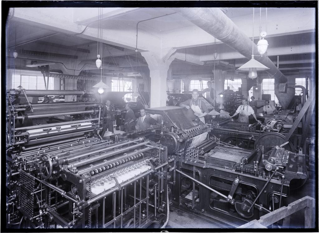Men in a workshop with printing presses, Coulls Somerville Wilkie, Crawford Street, Dunedin