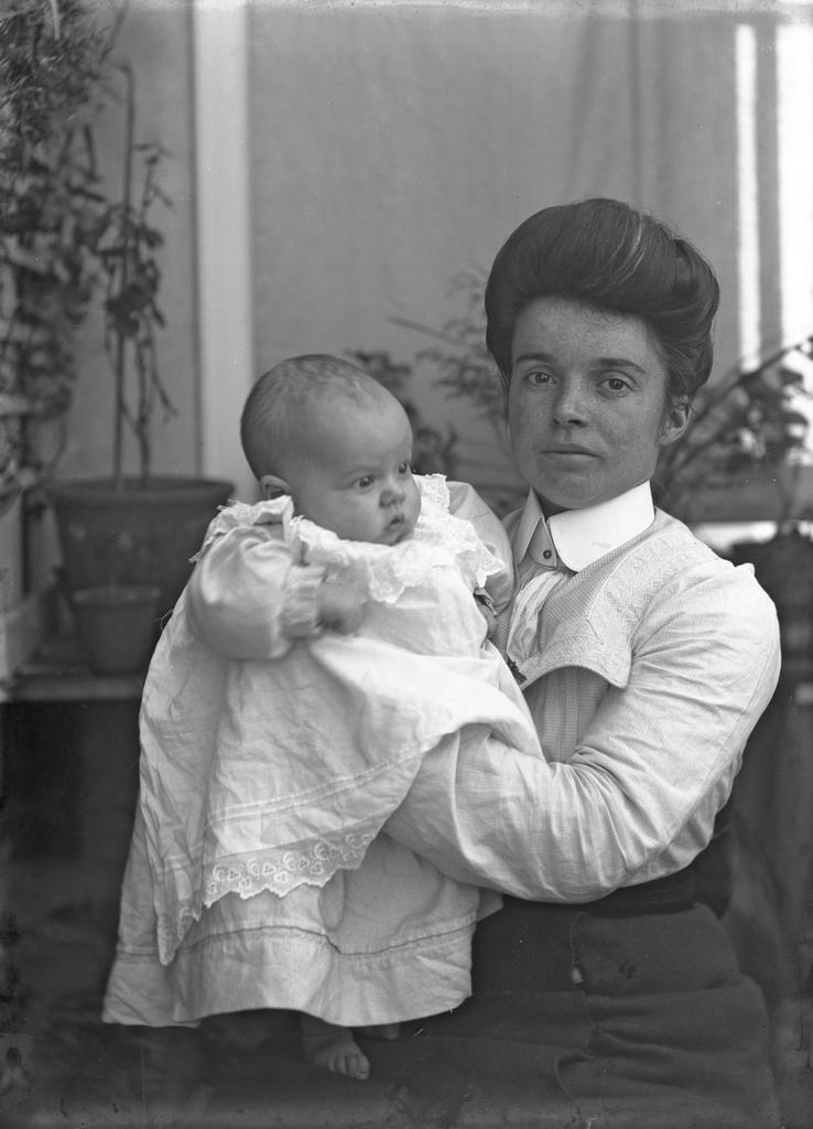 Fred McGeorge as a young baby, held by Ethel McGeorge