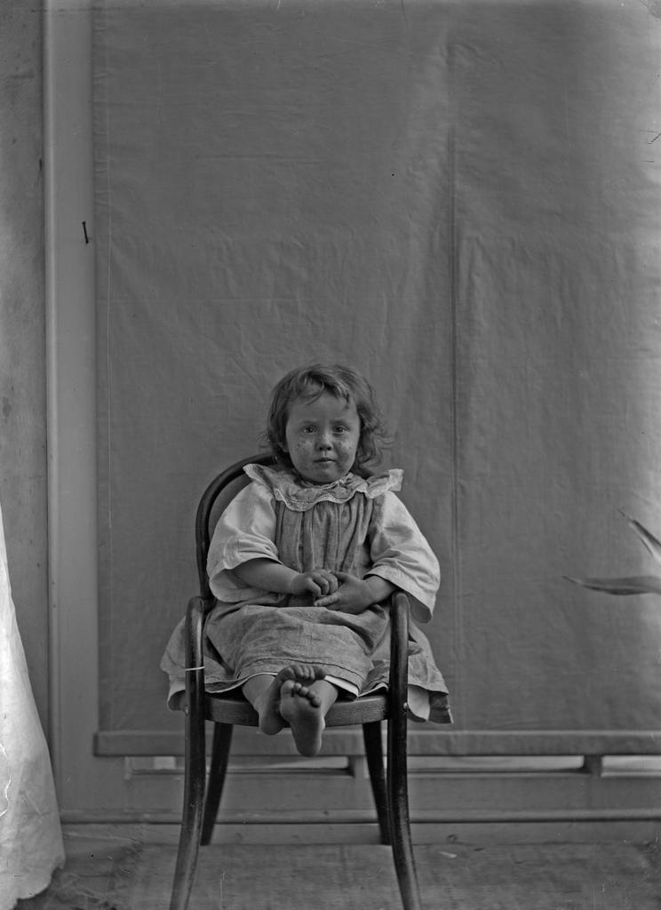 Vera McGeorge sitting in a chair