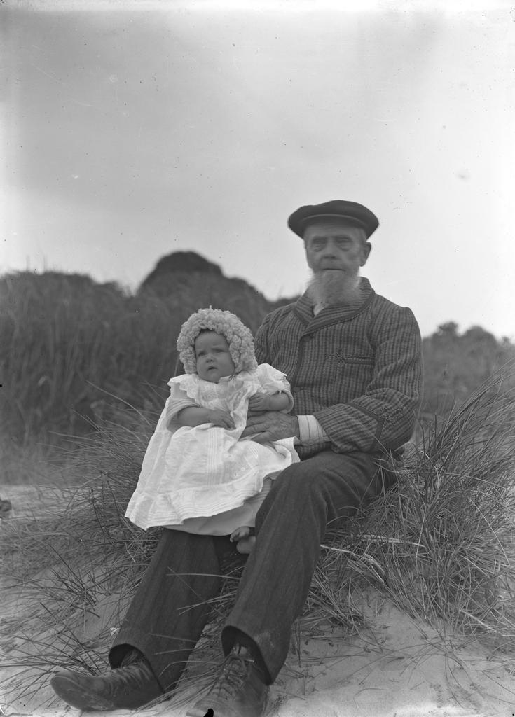 James McGeorge (Alex C. McGeorge's father) holding his granddaughter Alison