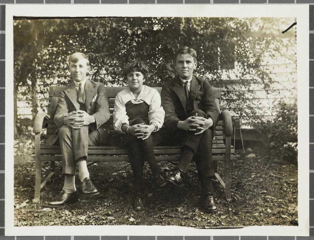 James Courage and two unidentified people