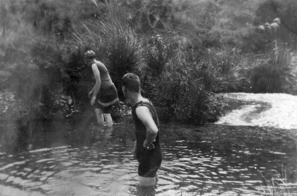 Young men swimming