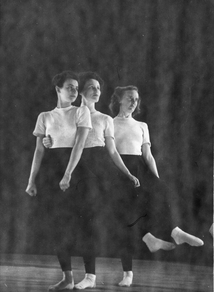 Three dancers facing front/right