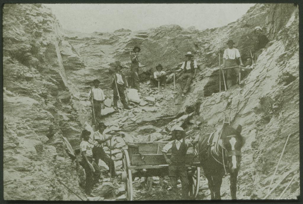 The shifting of rocks from a cutting