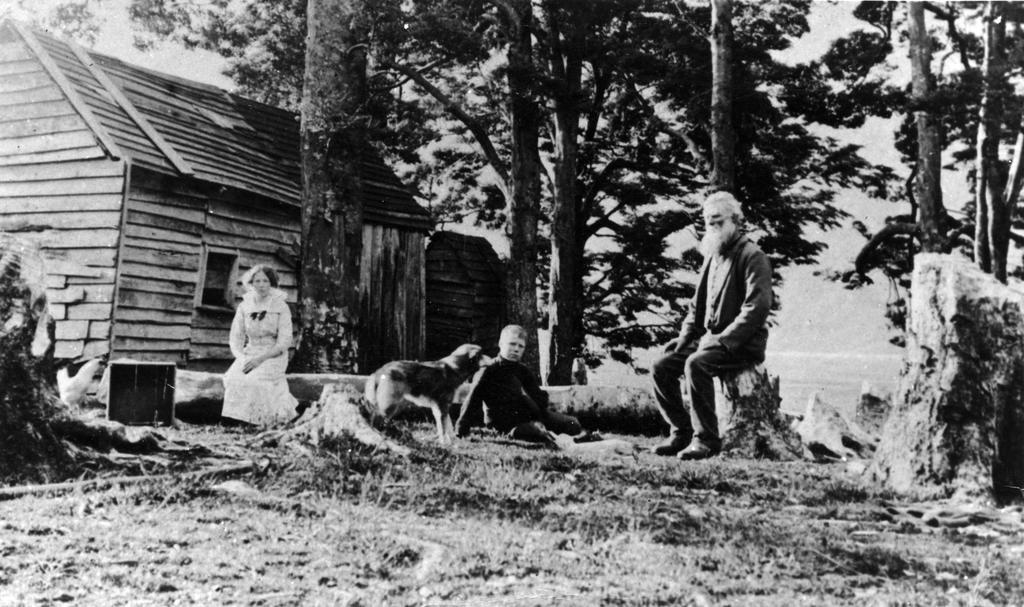 Mr and Mrs McPherson outside their house
