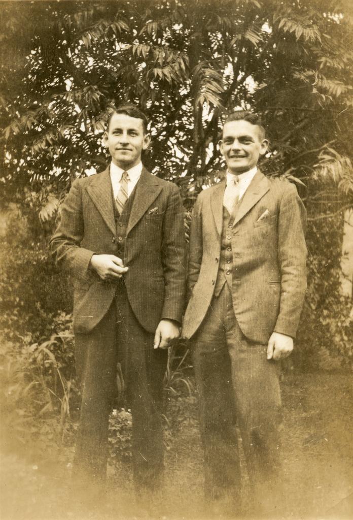 Two men standing