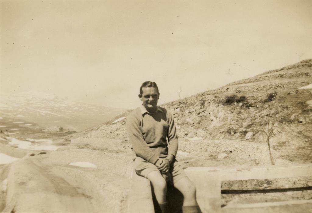 Noel Hulme sitting on wall