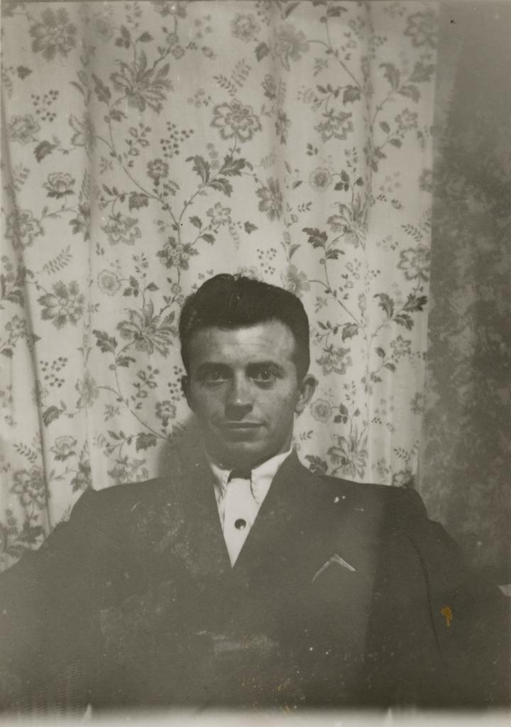 Portrait of man against wallpaper II