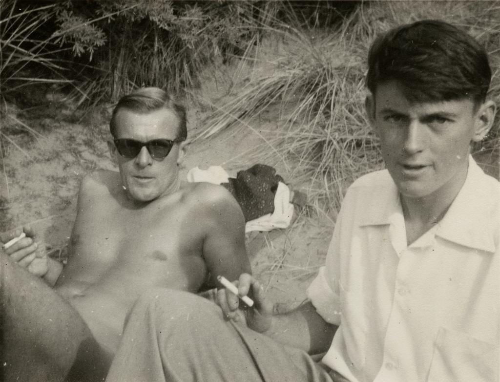 Two men with cigarettes