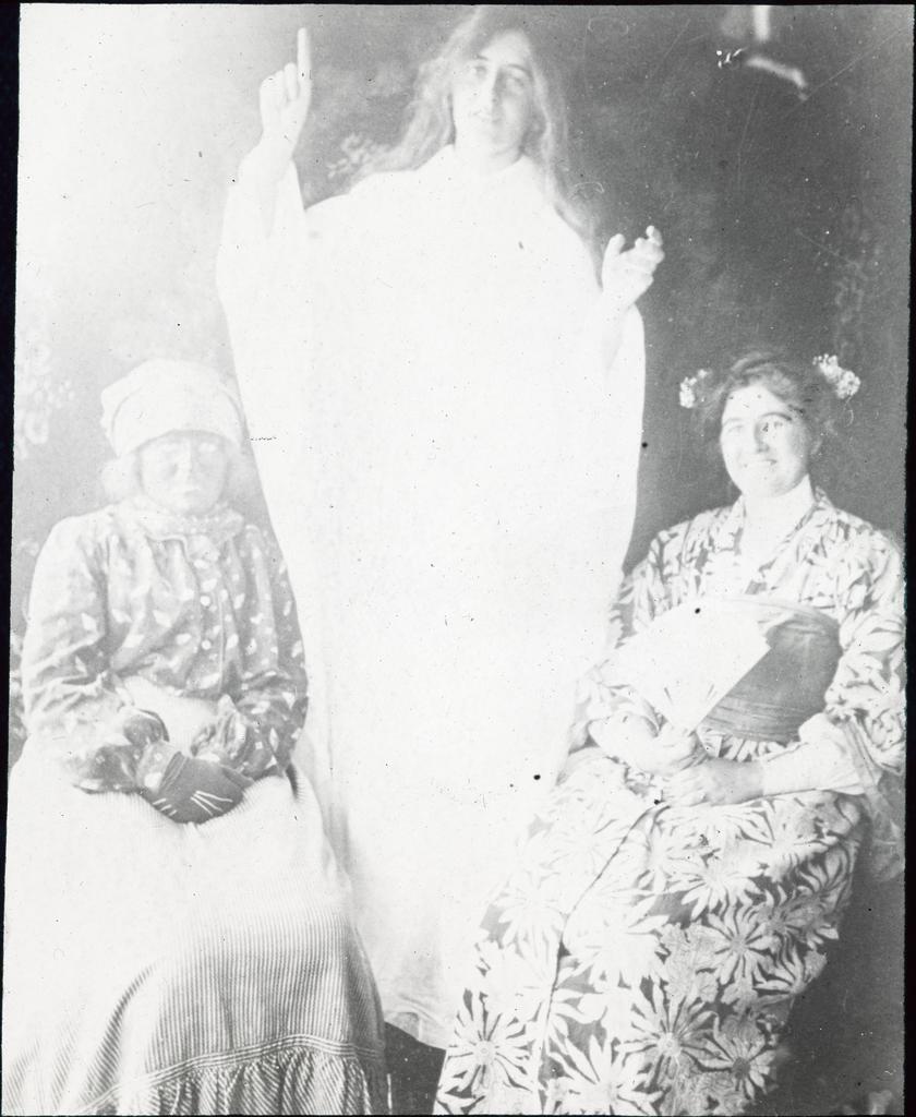 Three unidentified women in costume