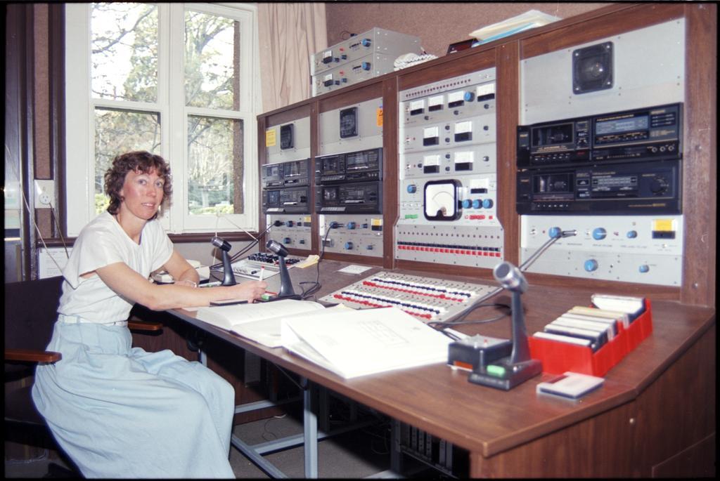 Elizabeth Purdie at Eihudie switchboard in audioconference control room