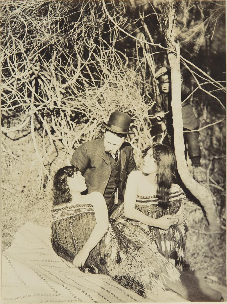 Two unidentified wāhine Māori and one unidentified man