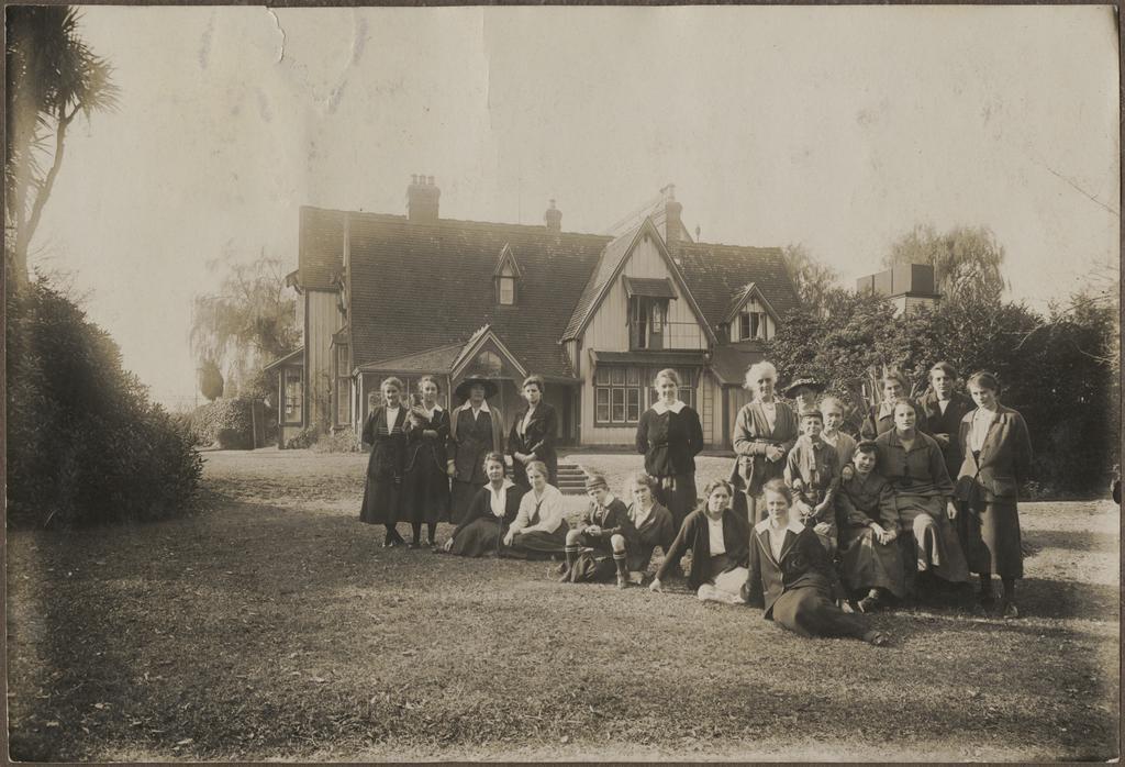 Staff and students on the lawn in front of Te Wai Pounamu College