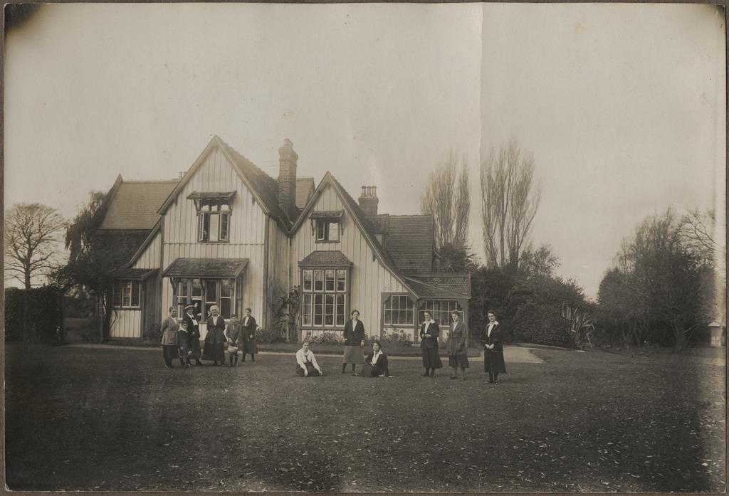 Staff and students on the lawn in front of Te Wai Pounamu College